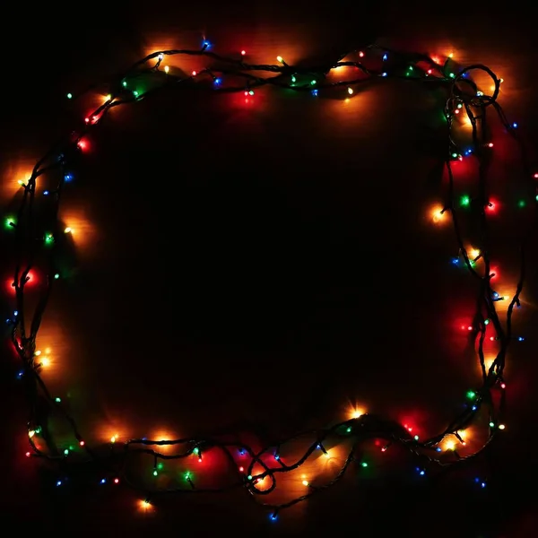 Luci Natale Sfondo Nero Con Spazio Copia Superficie Riflettente Colorata — Foto Stock