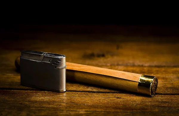 The old cigar lighter and — Stock Photo, Image