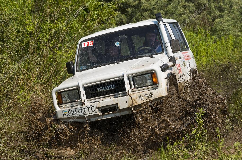 Lviv, Ukraine - May 30, 2015: Off-road vehicle ISUZU (No. 133) overcomes the track on  of   landfill near the city  Lviv.