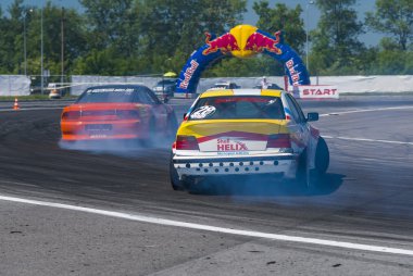 Drift cars brand Nissan and BMW overcome turn track clipart