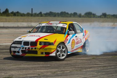 Rider V. Borovitsky  on the car brand BMW overcomes the track