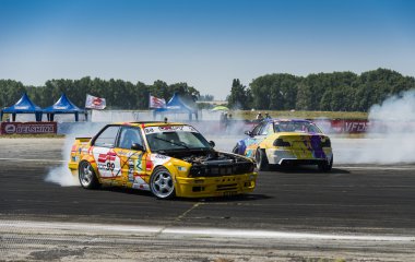 Riders  on the cars brand BMW   makes a mistake