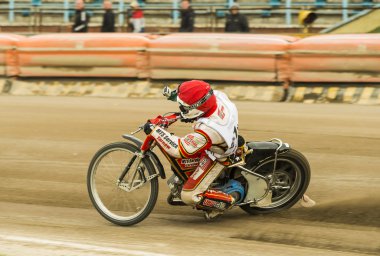 Unknown rider with GoPro camera overcomes the track clipart