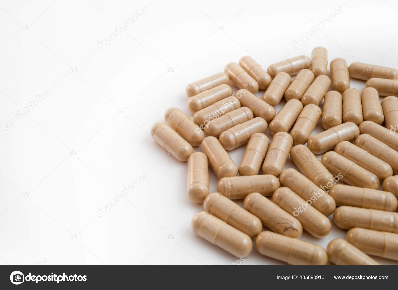 白色隔离背景下的褐色胶囊丸 图库照片 C Wpack Off 白色隔离背景下的褐色胶囊丸 图库照片 C Wpack Off