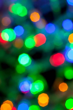 Çok renkli Noel ve yeni yıl ışıklarının bokeh dokusu