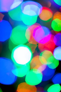Çok renkli Noel ve yeni yıl ışıklarının bokeh dokusu