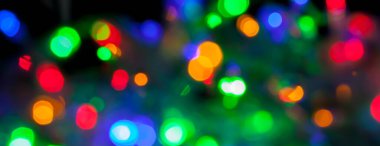 çok renkli Noel ve yeni yıl ışıklarının panorama bokeh dokusu