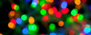 çok renkli Noel ve yeni yıl ışıklarının panorama bokeh dokusu