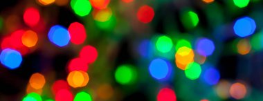 çok renkli Noel ve yeni yıl ışıklarının panorama bokeh dokusu