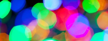 çok renkli Noel ve yeni yıl ışıklarının panorama bokeh dokusu