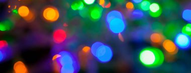 çok renkli Noel ve yeni yıl ışıklarının panorama bokeh dokusu