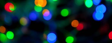 çok renkli Noel ve yeni yıl ışıklarının panorama bokeh dokusu