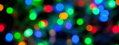 çok renkli Noel ve yeni yıl ışıklarının panorama bokeh dokusu