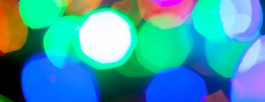 çok renkli Noel ve yeni yıl ışıklarının panorama bokeh dokusu