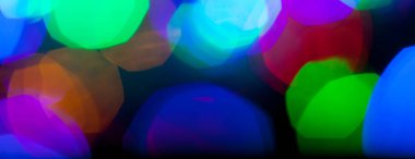 çok renkli Noel ve yeni yıl ışıklarının panorama bokeh dokusu