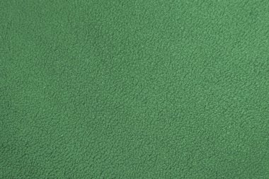 Üniformasız yeşil yün kumaş dokusu