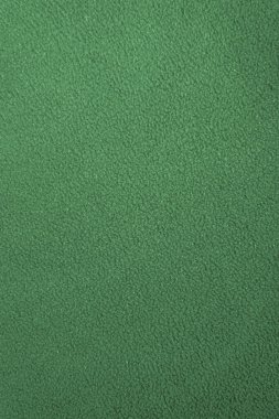 Üniformasız yeşil yün kumaş dokusu