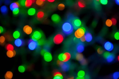 Çok renkli Noel ve yeni yıl ışıklarının bokeh dokusu