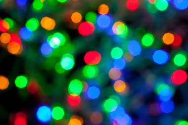 Çok renkli Noel ve yeni yıl ışıklarının bokeh dokusu