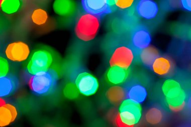 Çok renkli Noel ve yeni yıl ışıklarının bokeh dokusu
