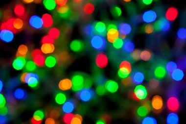 Çok renkli Noel ve yeni yıl ışıklarının bokeh dokusu