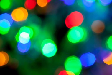 Çok renkli Noel ve yeni yıl ışıklarının bokeh dokusu
