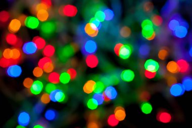 Çok renkli Noel ve yeni yıl ışıklarının bokeh dokusu