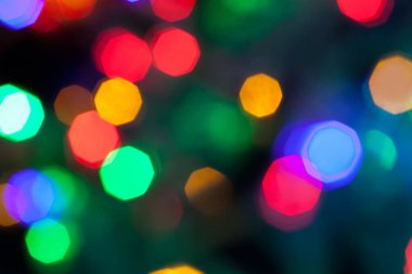 Çok renkli Noel ve yeni yıl ışıklarının bokeh dokusu