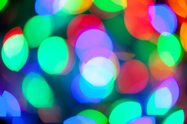 Çok renkli Noel ve yeni yıl ışıklarının bokeh dokusu