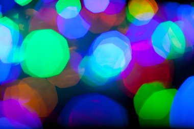 Çok renkli Noel ve yeni yıl ışıklarının bokeh dokusu