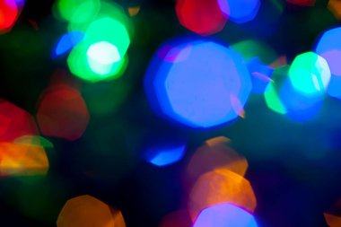 Çok renkli Noel ve yeni yıl ışıklarının bokeh dokusu