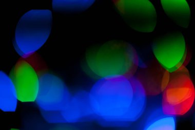 Çok renkli Noel ve yeni yıl ışıklarının bokeh dokusu