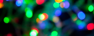 çok renkli Noel ve yeni yıl ışıklarının panorama bokeh dokusu