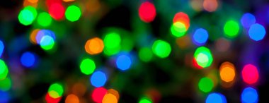 çok renkli Noel ve yeni yıl ışıklarının panorama bokeh dokusu