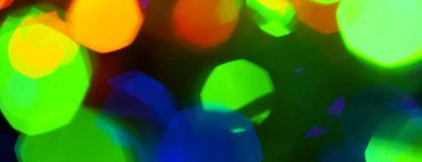 çok renkli Noel ve yeni yıl ışıklarının panorama bokeh dokusu