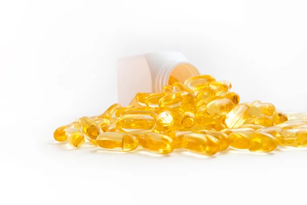 Omega Pil Menuangkan Keluar Dari Stoples Pada Latar Belakang Putih — Stok Foto