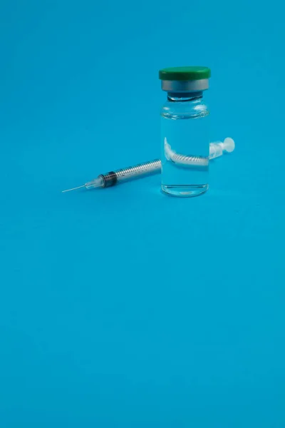 Syringe Ampoule Medicine Blue Background — Stock Photo, Image
