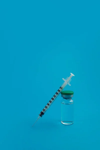 Syringe Ampoule Medicine Blue Background — Stock Photo, Image