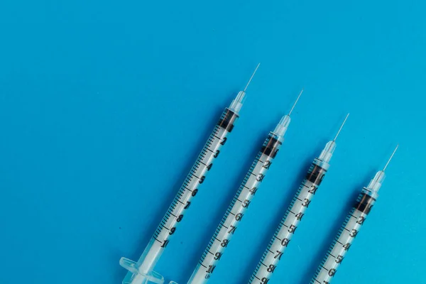 Medical Syringes Blue Background — Stock Photo, Image