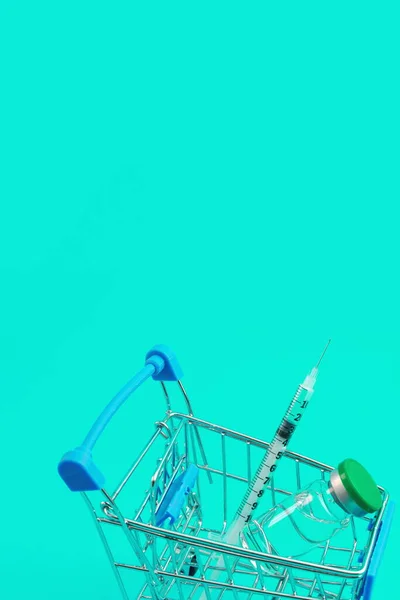 Supermarket Trolley Syringes Ampoule Blue Background — Stock Photo, Image