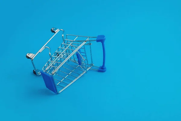 Supermarket Trolley Blue Background — Stock Photo, Image