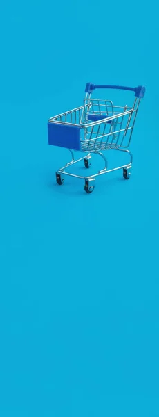 Bevásárlókocsi Kék Panorámás Háttérrel — Stock Fotó