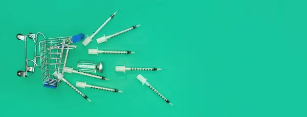 Supermarket Trolley Syringes Ampoule Green Panorama Background — Φωτογραφία Αρχείου