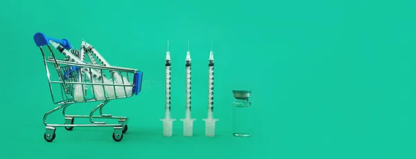 Supermarket Trolley Syringes Ampoule Green Panorama Background — Stock Photo, Image