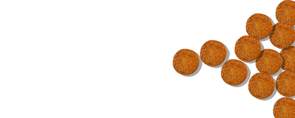 oatmeal cookies and scattered oatmeal on crumpled paper background