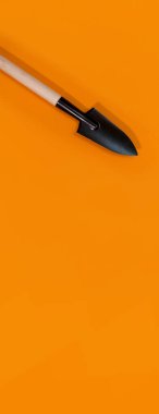 turuncu arkaplanda bahçe araçları panoraması