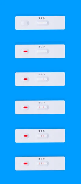 Covid 19検査でIgm抗体とIgg抗体を陽性結果で検出コロナウイルスエクスプレス検査カードです 青色の背景にCovid 19の迅速なテスト コロナウイルス検査 — ストック写真