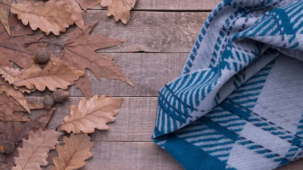 autumn leave. on wood background. autumn background