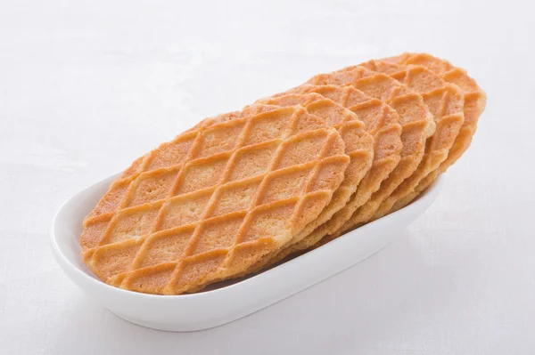 Sweet waffles on white plate — Stock Photo, Image