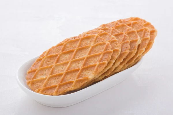 Süße Waffeln auf weißem Teller — Stockfoto